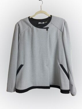 Calvin Klein women’s jacket snap closure, black and white.